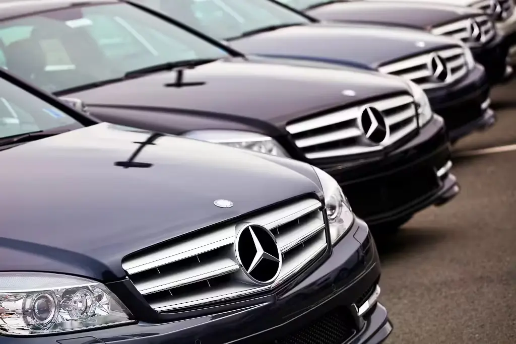 five black Mercedes-Benz in row ready for transfer services